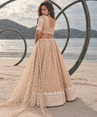 BEIGE YELLOW NET THREAD WITH ZARI AND SEQUIN WORK FESTIVE LEHENGA CHOLI 2