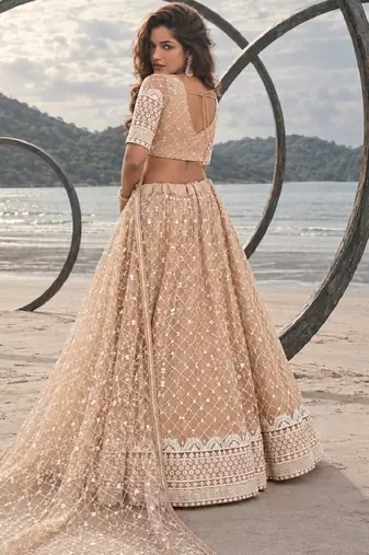 BEIGE YELLOW NET THREAD WITH ZARI AND SEQUIN WORK FESTIVE LEHENGA CHOLI