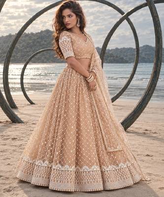 BEIGE YELLOW NET THREAD WITH ZARI AND SEQUIN WORK FESTIVE LEHENGA CHOLI 3