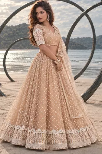 BEIGE YELLOW NET THREAD WITH ZARI AND SEQUIN WORK FESTIVE LEHENGA CHOLI