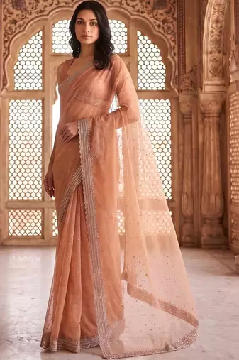 Peach embellished beads and stones tissue saree