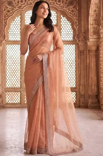 Peach embellished beads and stones tissue saree