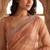 Peach embellished beads and stones tissue saree