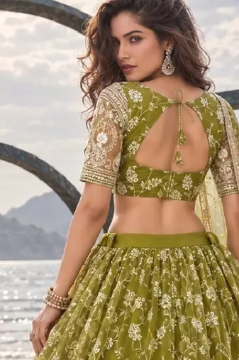 OLIVE GREEN NET THREAD WITH ZARI AND SEQUINCE WORK FESTIVE LEHENGA CHOLI SET FOR WOMEN'S