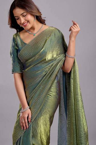 Green embellished sequinned organza heavy work saree