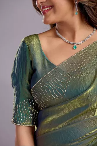 Green embellished sequinned organza heavy work saree