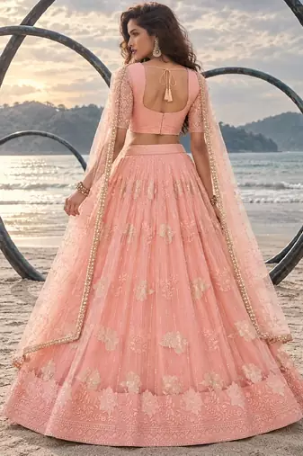 PEACH NET THREAD WITH ZARI AND SEQUIN WORK FESTIVE LEHENGA CHOLI