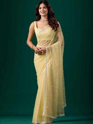 Yellow woven design embroidered  chiffon saree 1