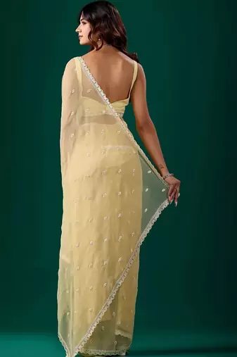 Yellow woven design embroidered  chiffon saree