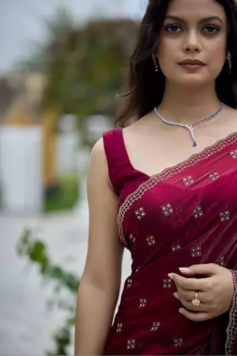 Maroon embellished embroidered silk blend saree