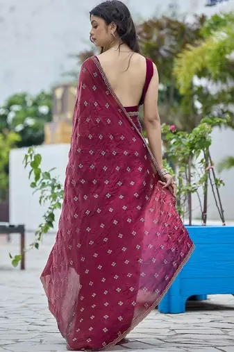 Maroon embellished embroidered silk blend saree