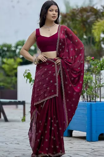 Maroon embellished embroidered silk blend saree