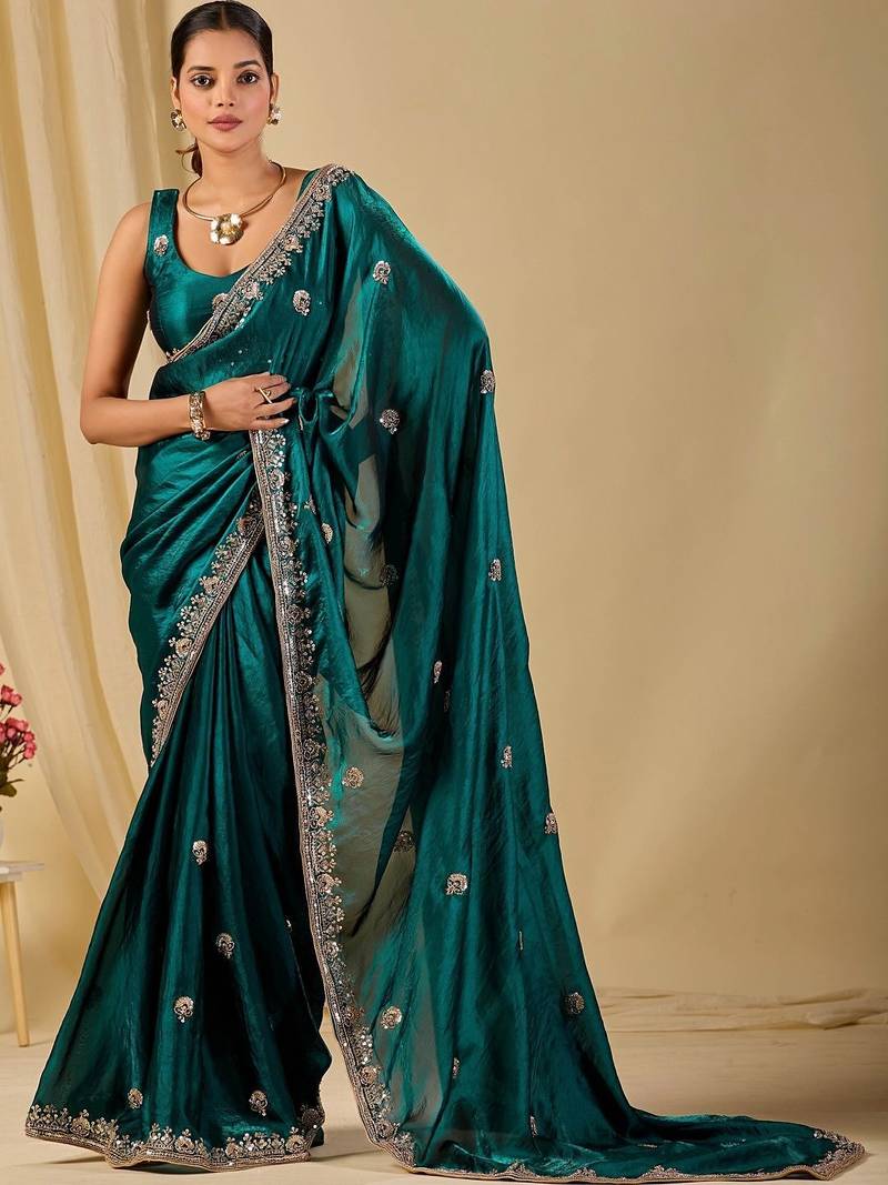 Teal ethnic motifs embroidered organza saree