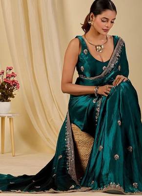 Teal ethnic motifs embroidered organza saree 3