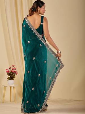 Teal ethnic motifs embroidered organza saree 5