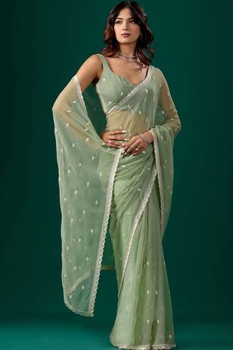 Sea green woven design embroidered  chiffon saree