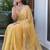 Yellow sequinned silk cotton saree
