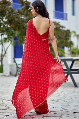 Red embellished beads and stones silk blend saree