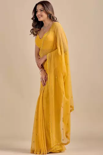 Yellow embellished zari  chiffon saree