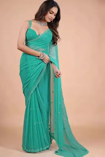 Sea green embellished sequinned  chiffon heavy work saree