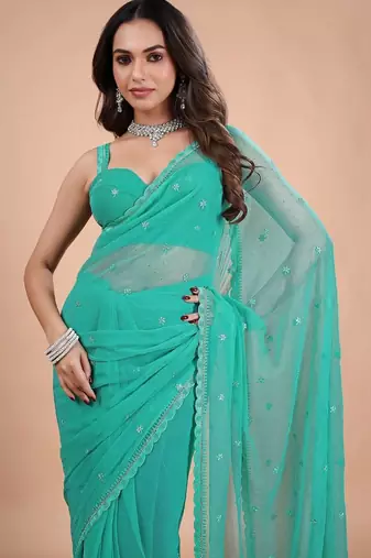 Sea green embellished sequinned  chiffon heavy work saree
