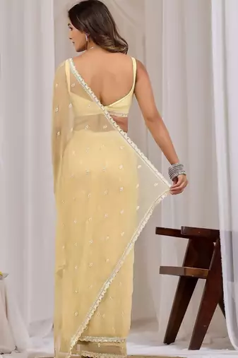 Yellow ethnic motifs embroidered  chiffon saree