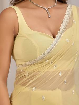 Yellow ethnic motifs embroidered  chiffon saree 5
