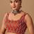 Orange embellished beads and stones satin heavy work saree