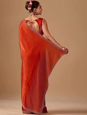 Orange embellished beads and stones satin heavy work saree 5