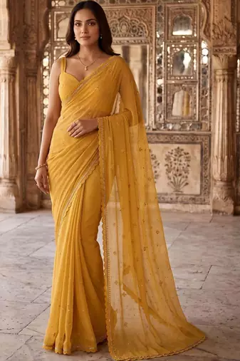 Mustard ethnic motifs embroidered poly chiffon saree