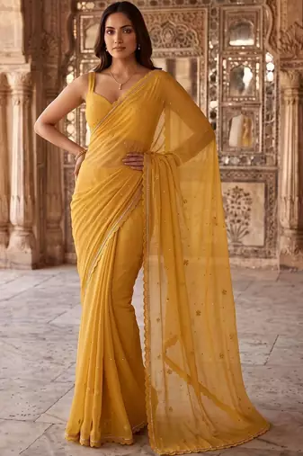Mustard ethnic motifs embroidered poly chiffon saree