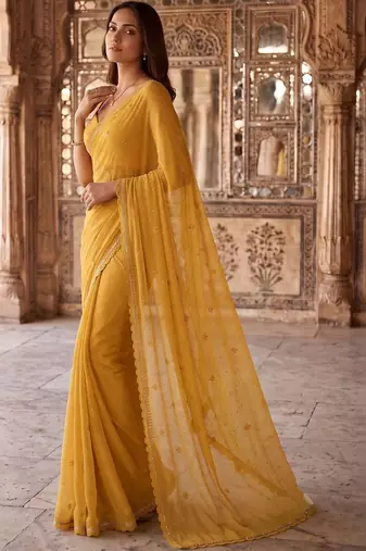 Mustard ethnic motifs embroidered poly chiffon saree