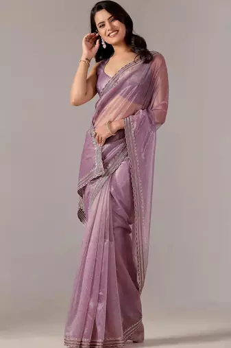 Lavender embellished zari tissue heavy work saree