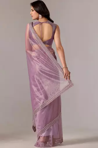 Lavender embellished zari tissue heavy work saree