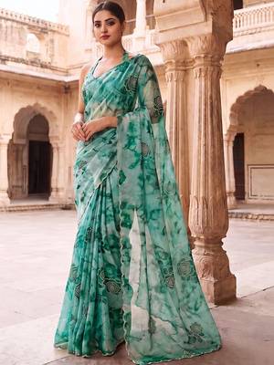 Teal embroidered organza saree 1
