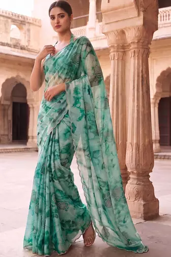 Teal embroidered organza saree