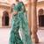Teal embroidered organza saree
