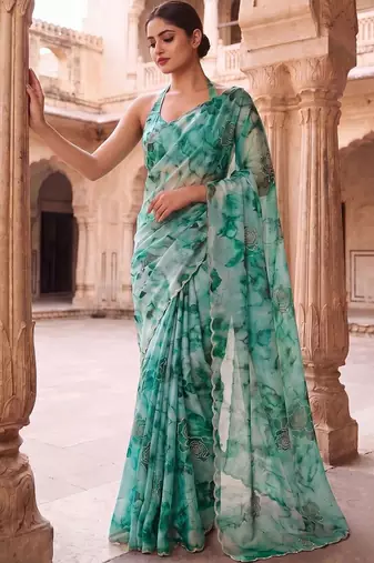 Teal embroidered organza saree
