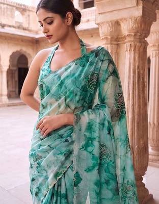 Teal embroidered organza saree 4