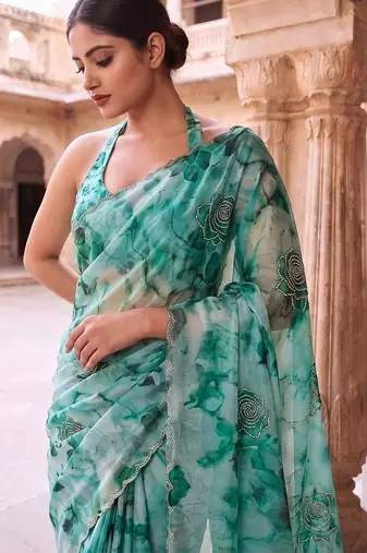 Teal embroidered organza saree