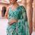 Teal embroidered organza saree