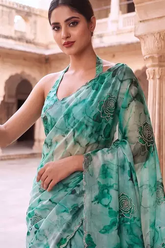 Teal embroidered organza saree