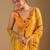 Yellow leheriya beads and stones poly chiffon saree