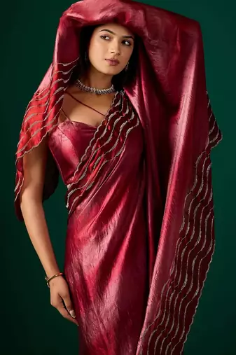 Maroon embellished beads and stones satin saree