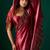 Maroon embellished beads and stones satin saree