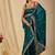 Teal ethnic motifs embroidered organza saree
