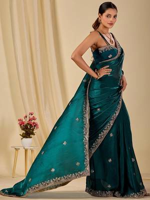 Teal ethnic motifs embroidered organza saree 3