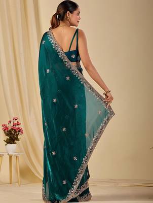 Teal ethnic motifs embroidered organza saree 5