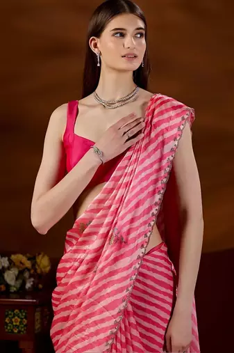 Pink women leheriya embroidered saree