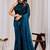 Teal beads and stones organza saree